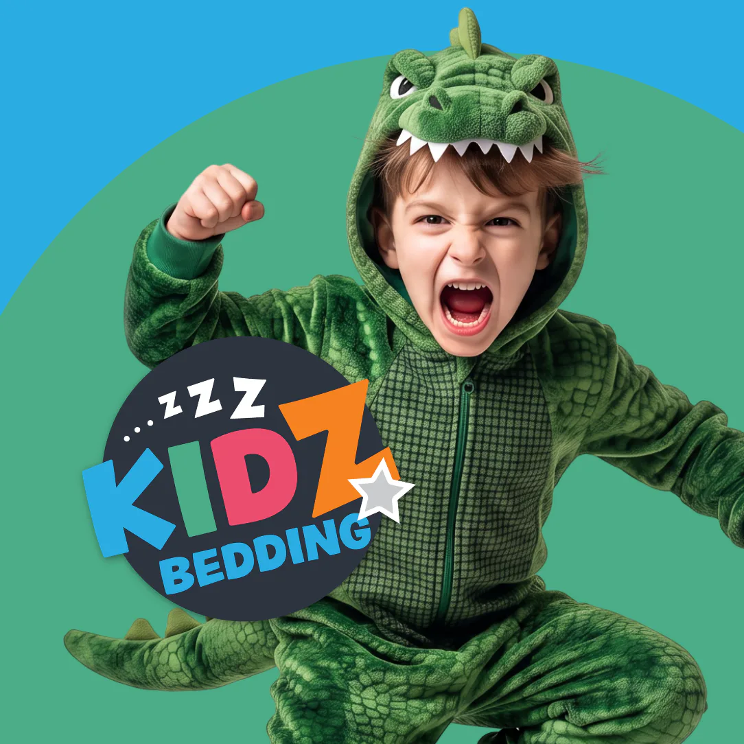 Young child wearing a green textured dinosaur onesie costume with horns and teeth, striking a playful roaring pose with fist raised against a green circular background.